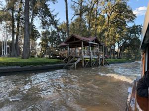 a building in the middle of a river at Sweet Home 1 in Tigre +8 photos