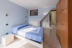 En eller flere senge i et værelse på Casa vacanze Casalena