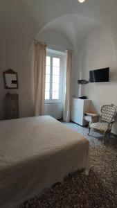 Postel nebo postele na pokoji v ubytování Casa Mazzini di Casa Italia