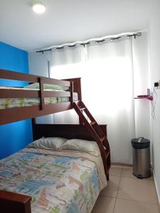 a bedroom with a bunk bed in a room at 2201 Playa EL Palmar in Las Palmeras +42 photos