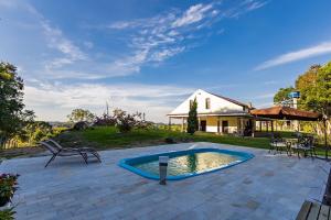 Πισίνα στο ή κοντά στο Casa de Campo proximo a Curitiba em Mandirituba CHACARA VILLAVERLA