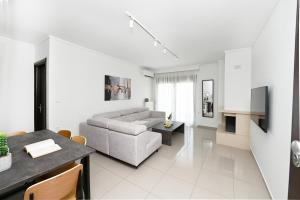 Ένα ή περισσότερα κρεβάτια σε δωμάτιο στο Icon Premium Apartments
