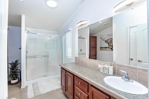 a bathroom with a sink and a shower at Lake Havasu Oasis in Lake Havasu City +15 photos