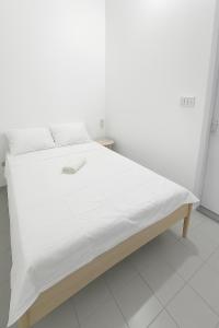Una cama o camas en una habitación de Studio SAN