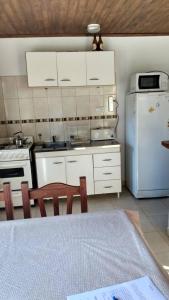 Η κουζίνα ή μικρή κουζίνα στο El Descanso +6 φωτογραφίες