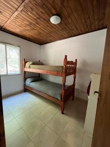 Ένα ή περισσότερα κρεβάτια σε δωμάτιο στο El Descanso