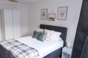 Ένα ή περισσότερα κρεβάτια σε δωμάτιο στο Stylish Apartment S3