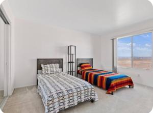 Postel nebo postele na pokoji v ubytování Resort Style House + 35 fotografií