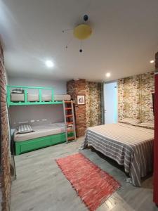 Postel nebo postele na pokoji v ubytování Le LOFT