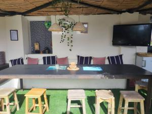 TV a/nebo společenská místnost v ubytování Le LOFT
