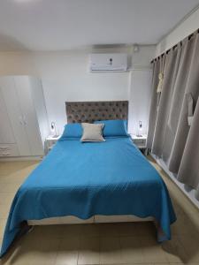 Postel nebo postele na pokoji v ubytování Monoambiente cómodo zona centro