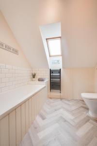 Vannituba majutusasutuses Curlew Cottage