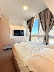 Postel nebo postele na pokoji v ubytování Livin Resort Home 317