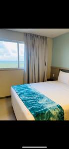 Postel nebo postele na pokoji v ubytování Aqualand Resort