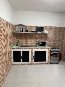 Dapur atau dapur kecil di Résidence aida dème