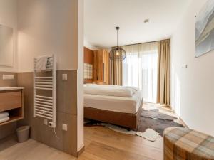 Postel nebo postele na pokoji v ubytování Grebenzen Lodge 51A