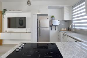 Kuchyň nebo kuchyňský kout v ubytování Cozy Nest,1bdrm apt: adventure & relax @Punta Cana