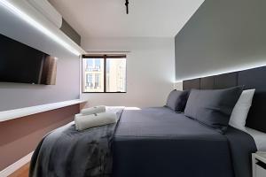 Postel nebo postele na pokoji v ubytování Ibirapuera Premium Flat II