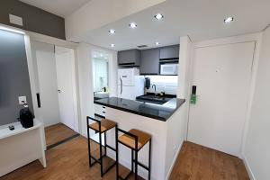 Kuchyň nebo kuchyňský kout v ubytování Ibirapuera Premium Flat II