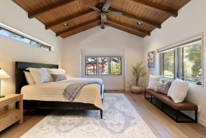 a bedroom with a bed and a ceiling fan at Oaks & Madeira A Luxury Wine Escape in Paso Robles in Paso Robles