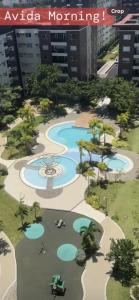 arial view of a water park in a city at Avida tower 1 L21 staycation condotel rm1002 in Iloilo City