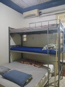 Giường trong phòng chung tại SapucAli Hostel Privativo +222 ảnh