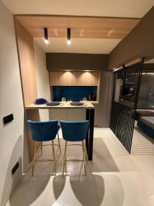 Η κουζίνα ή μικρή κουζίνα στο Vaniedda Suite +17 φωτογραφίες