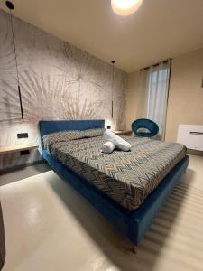 Ένα ή περισσότερα κρεβάτια σε δωμάτιο στο Vaniedda Suite