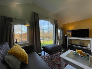 Χώρος καθιστικού στο Tranquil Lakeside Stay for 4 guests
