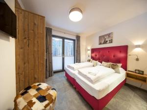 Postel nebo postele na pokoji v ubytování Chalet in Neukirchen near Wildkogel Ski Arena + 67 fotografií