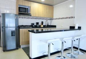 Η κουζίνα ή μικρή κουζίνα στο Apartamento 2 piso