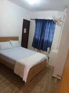 Katil atau katil-katil dalam bilik di Nina's bedrooms