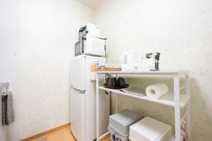 Η κουζίνα ή μικρή κουζίνα στο 瓦の灯 +81 φωτογραφίες