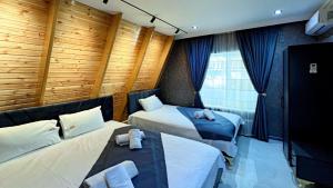 Postel nebo postele na pokoji v ubytování SS Mountain A-Frame Villa + 25 fotografií