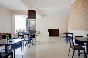 Restoran või mõni muu söögikoht majutusasutuses Dancenter Labuhan Raya