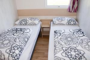 Postel nebo postele na pokoji v ubytování Campingplatz Jungferweiher