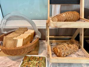 a display of bread and pastries in a bakery at Centro One Bangla in Patong Beach