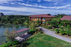 an aerial view of a resort with a lake at Tamali Hotel in Ban Yuan Lae