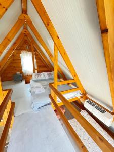 an overhead view of a room in a attic at Bungalow-8 in Karaburun Boyabağ Bay in Karaburun +30 photos