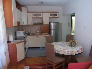 Kuchyň nebo kuchyňský kout v ubytování Suza Apartment