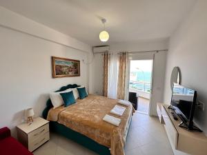 Televisyen dan/atau pusat hiburan di Hotel Bella Vista
