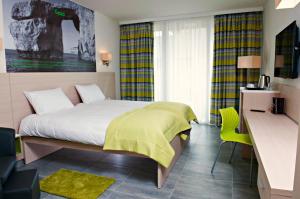 Postel nebo postele na pokoji v ubytování Hotel Santana