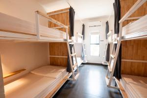 Postel nebo postele na pokoji v ubytování Onederz Koh Rong