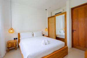 Ένα ή περισσότερα κρεβάτια σε δωμάτιο στο Villa Amal 9 +24 φωτογραφίες