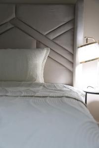 Ένα ή περισσότερα κρεβάτια σε δωμάτιο στο Quite and cozy studio +8 φωτογραφίες