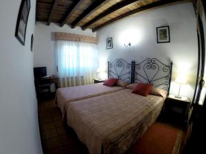 Posteľ alebo postele v izbe v ubytovaní Casa Rural El Regajo Valle del Jerte