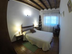 Posteľ alebo postele v izbe v ubytovaní Casa Rural El Regajo Valle del Jerte