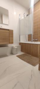 a bathroom with a toilet and a sink at Yutz and Zen in Basse-Yutz +33 photos
