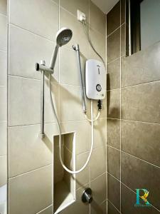 a shower with a shower head in a bathroom at Parc Regency by RR JBcity in Johor Bahru +78 photos