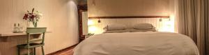 Postel nebo postele na pokoji v ubytování Hotel Casa Zapallar